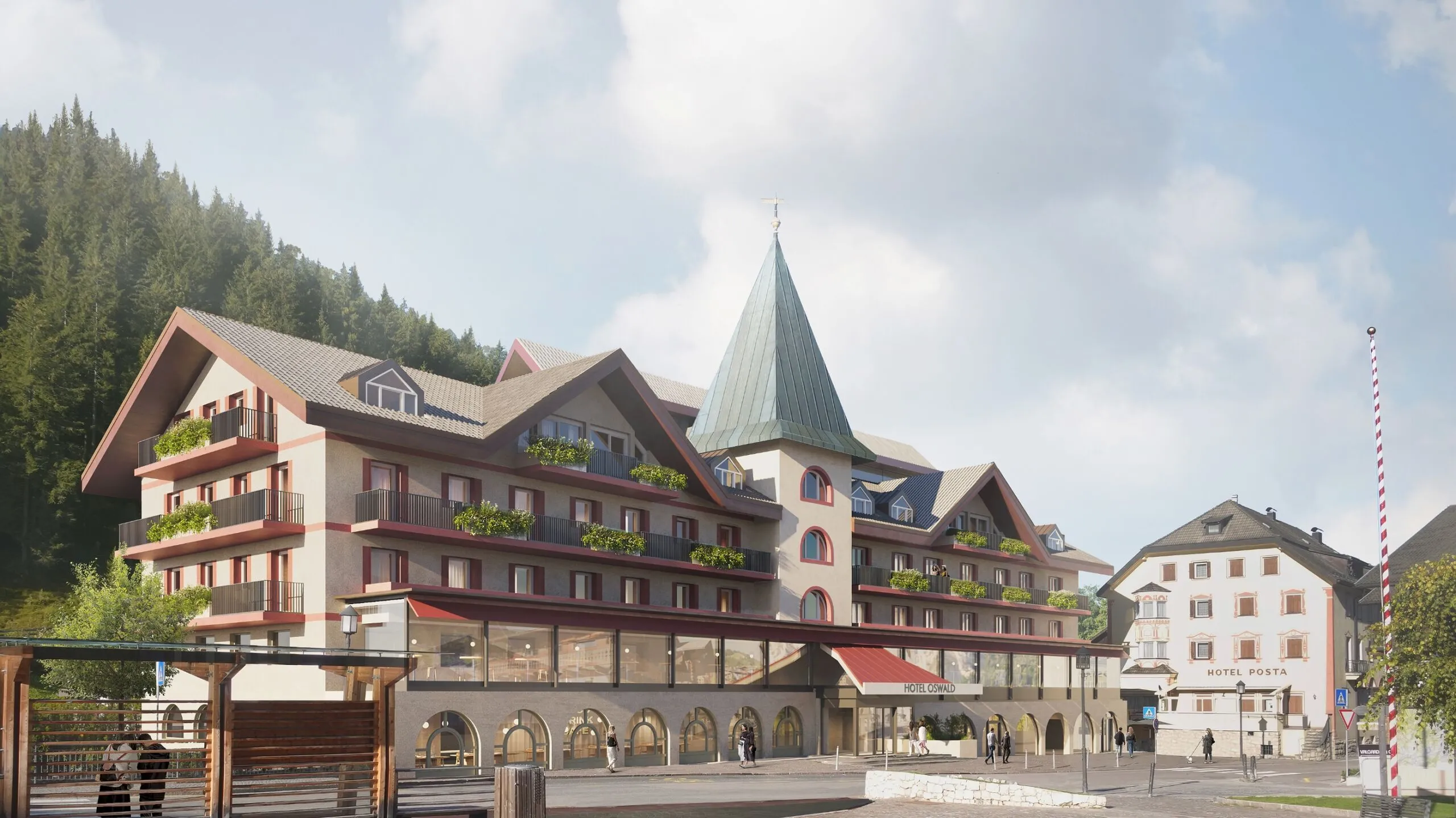 View of the main square of Selva di Val Gardena with Hotel Oswald in the background, recognizable by its distinctive turret and the region’s typical architecture.